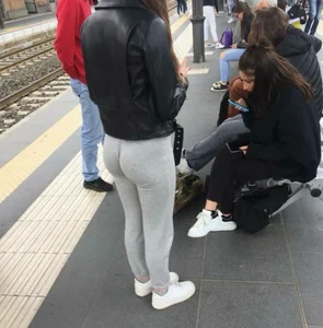 Cute chick super tight gray leggings at train station