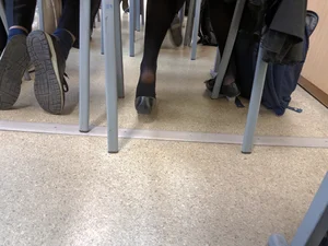 Teen College Girl in Black Pantyhose Dangling Her Flats in Class