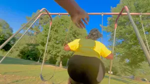 Pushing Big Booty Ebony in Black Shorts on the Swings