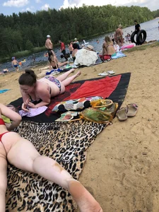 Girl Standing Up on Her Knees Doggy Style at a Beach Photos