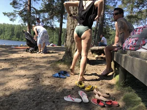Candid Girl Putting On Swimsuit and Undressing at the Forest Lake Beach Gallery