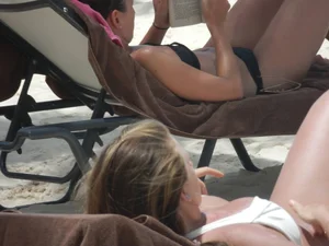 Bikini babe at the beach with nice tits and ass