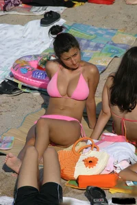 Beach voyeur girls in bikinis, thongs and topless