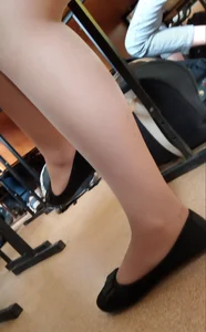Girl's Crossed Legs in Pantyhose and Flats Classroom Closeup Creepshot