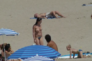 Girls on a nude beach in Sitges, Spain