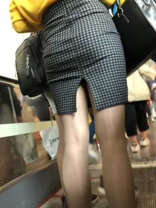 Ass in Grey Chequered Skirt and Thin Legs in Pantyhose Subway Escalator Closeup Creepshots