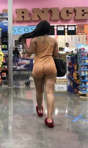 Latina with hard nipples and a big booty in tight spandex shorts outfit