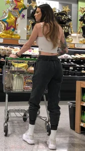 Tatted Fit slim brunette beauty at the market