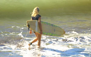 Candid surfer babes on the beach and in bikinis