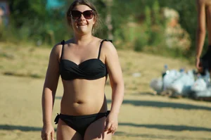 Chubby Girl in Sunglasses Beach Photos