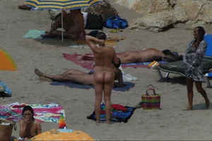 Girls on a nude beach in Sitges, Spain