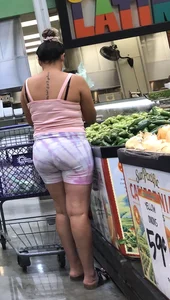 Thick Latina babe with a nice ass in tight patterned shorts