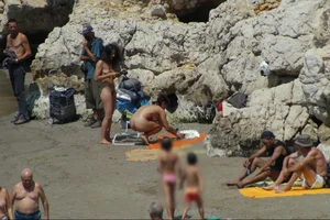 Girls on a nude beach in Sitges, Spain