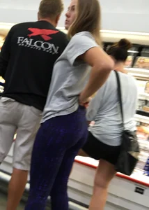 Blonde ass grocery shopping in blue and black leggings