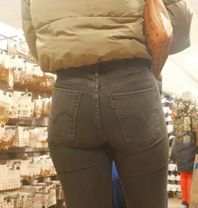 Hot girl with a worked out ass in tight grey jeans