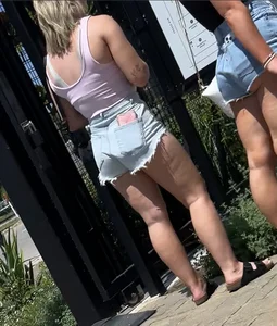 Blonde in cut offs with friends