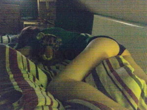 Awesome home creepshots of a young girl in panties laying in bed