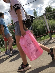 Cute Girl in Denim Shorts Walking Down a Railway Station Gallery