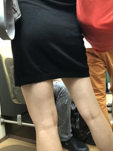 Girl with Hot Ass and Legs with Pale Skin in a Dress Standing in a Subway Train Candid Closeup
