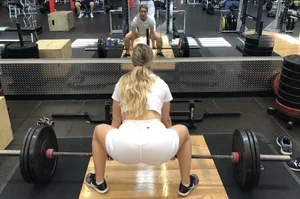 Blonde in Spandex Shorts and a Top Working Out