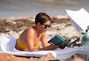 Frankie Bridge nip slips in a bikini on the beach