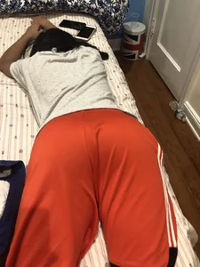 Ass in Sweatpants - Girl Lying in Bed