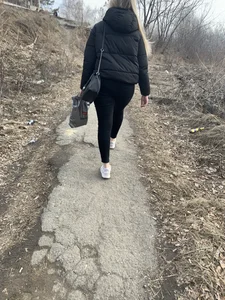 Blonde girl wearing tight pants walking down the road creepshots