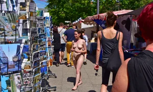 Only one is nude - group photos where only 1 girl is naked, and the rest of the people are dressed