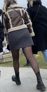Street creepshots of a girl in a skirt and black pantyhose