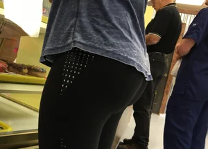 Nice round ass in leggings in line with no face