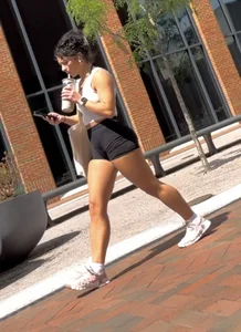 Curly Campus Brunette with amazing Bubble Butt in Tight Shorts (oc)