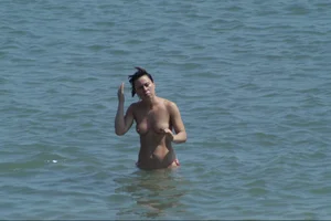 Girls on a nude beach in Sitges, Spain