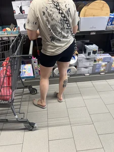 Milf in black biker shorts and flip flops
