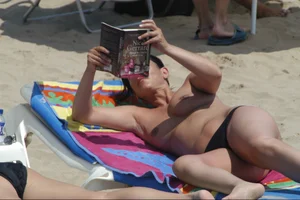 Girls on a nude beach in Sitges, Spain