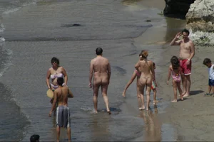 Girls on a nude beach in Sitges, Spain