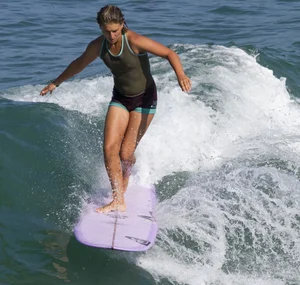 Candid surfer babes on the beach and in bikinis