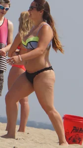 Thick girl on the beach in a bikini