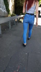 Redhead with a nice ass in tight jeans walking