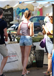 Beautiful teen out with boyfriend in short jean shorts