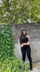Hot Girl in a Top And Leggings Street Photos
