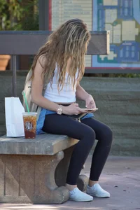 Beautiful babe out walking in leggings and showing some cleavage of her perfect tits