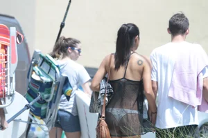 Sexy Florida girl showing her white thong bikini under see through dress