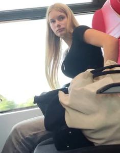 Hot busty blonde on train
