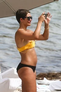 Frankie Bridge nip slips in a bikini on the beach