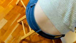 Booty in pulled down jeans closeup