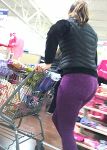 Milf shopping with a nice ass in purple leggings