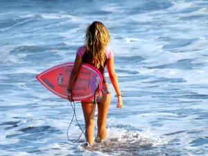 Candid surfer babes on the beach and in bikinis