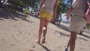 Milf in yellow shorts with vpl and a wedgie