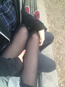 Teen JB Legs in Black Pantyhose on a Street Bench Held on Lap by Her Boyfriend