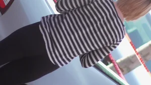 Strawberry blonde cutie showing stomach and in leggings